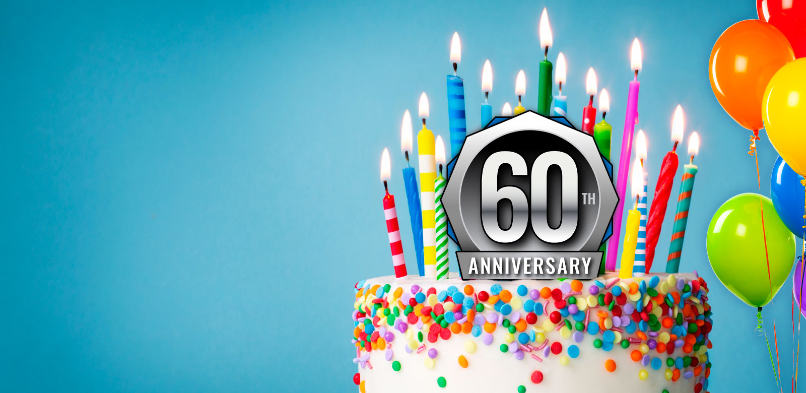 Linked image showing 60th anniversary cake and balloons.